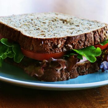 Delicious and nutritious homemade sandwich with whole wheat bread and fresh vegetables.